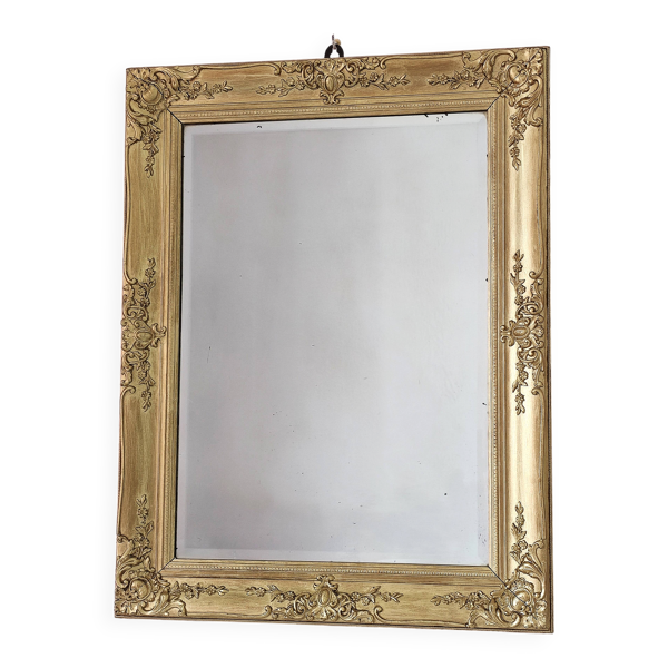 Miroir ancien doré richement sculpté