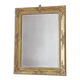 Richly carved antique gilded mirror
