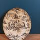 Oval frame wood gilded stucco patinated couple