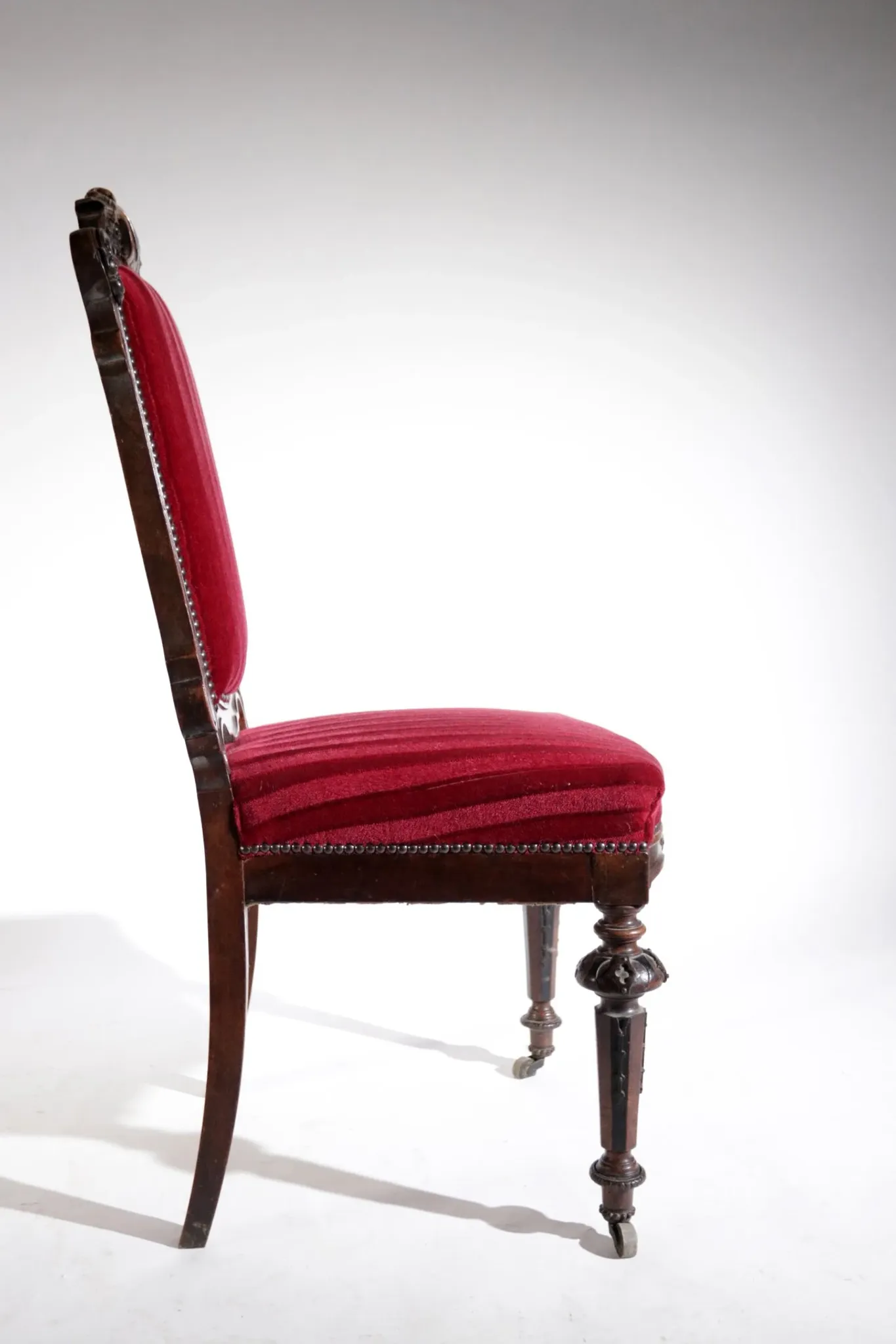 Nineteenth-century French carved chair with red velvet