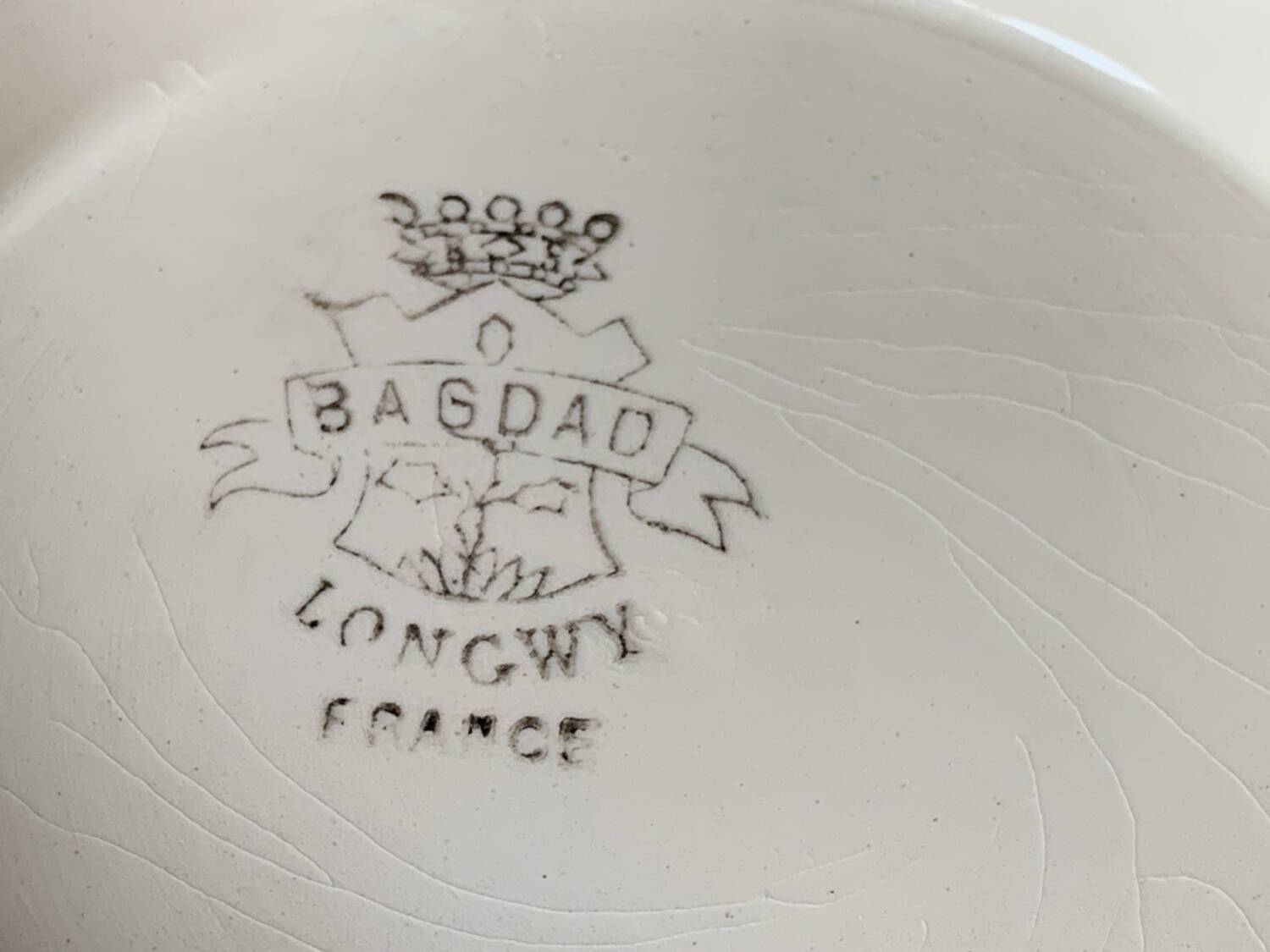 Two old Longwy Bagdad pedestal plates