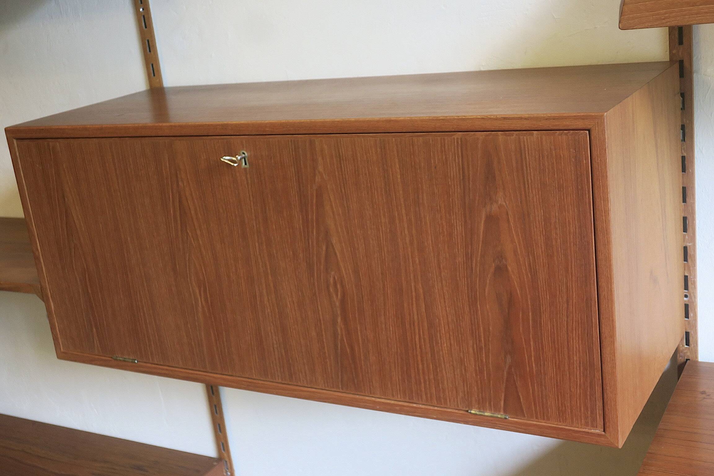 Modular 3-compartment teak wall shelving system with desk and lighting by Kai Kristiansen for FM, Denmark, 1960s