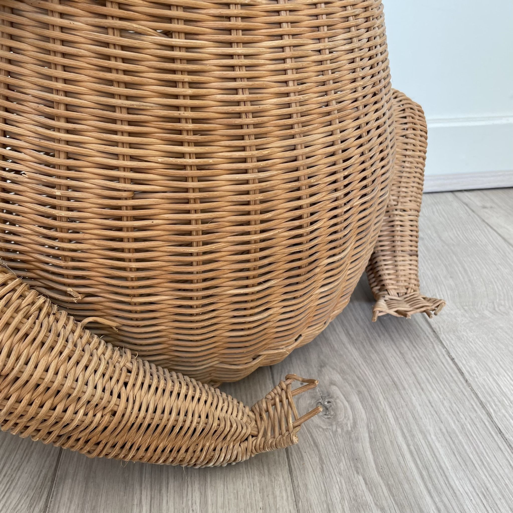 Wicker frog magazine holder by Olivier Cajan