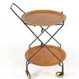 Trolley with loose round trays in the style of Jie Giantofte