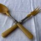 Old salad service in horn and silver metal