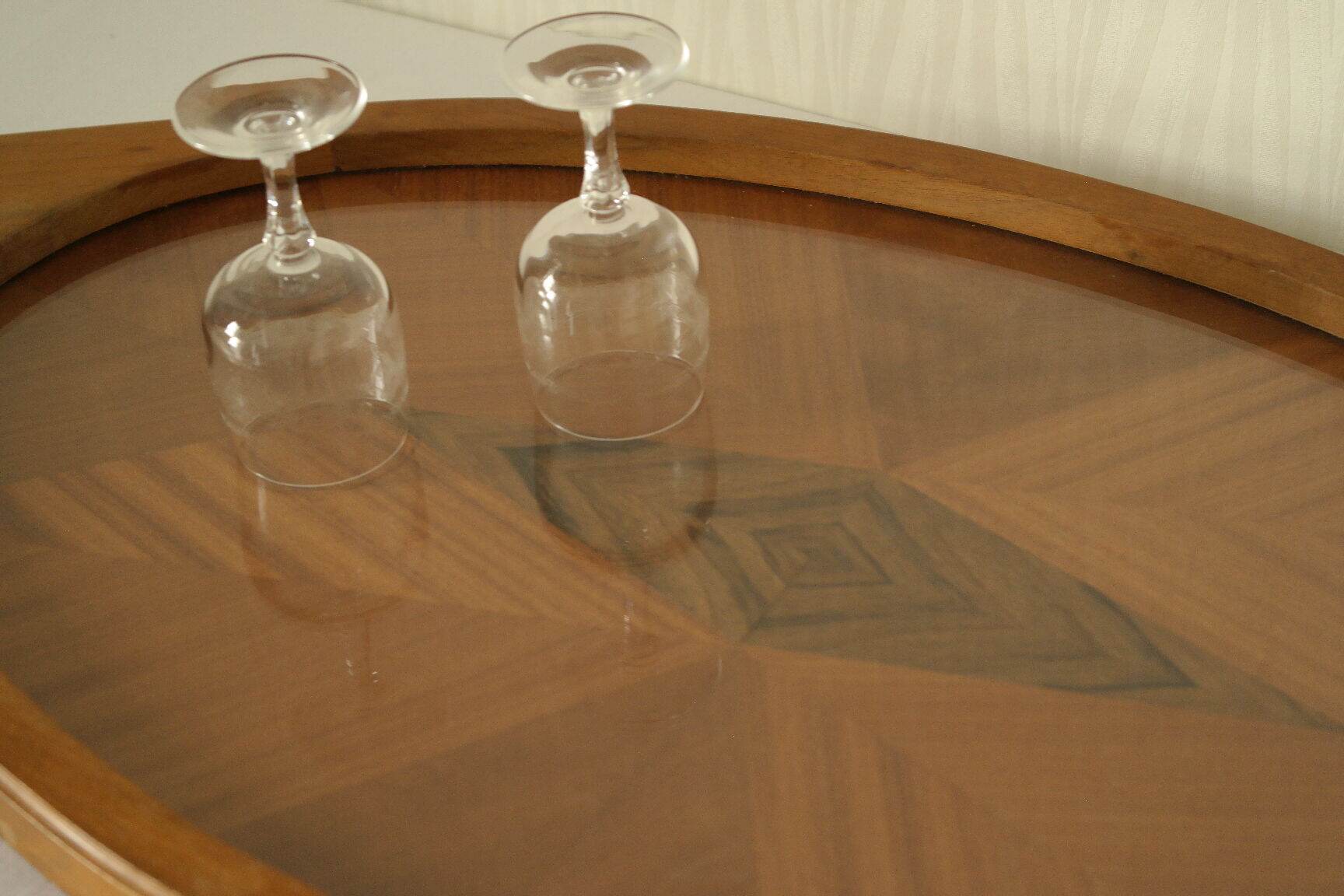 Oval wooden tray with glass and artisanal marquetry from the 70s.