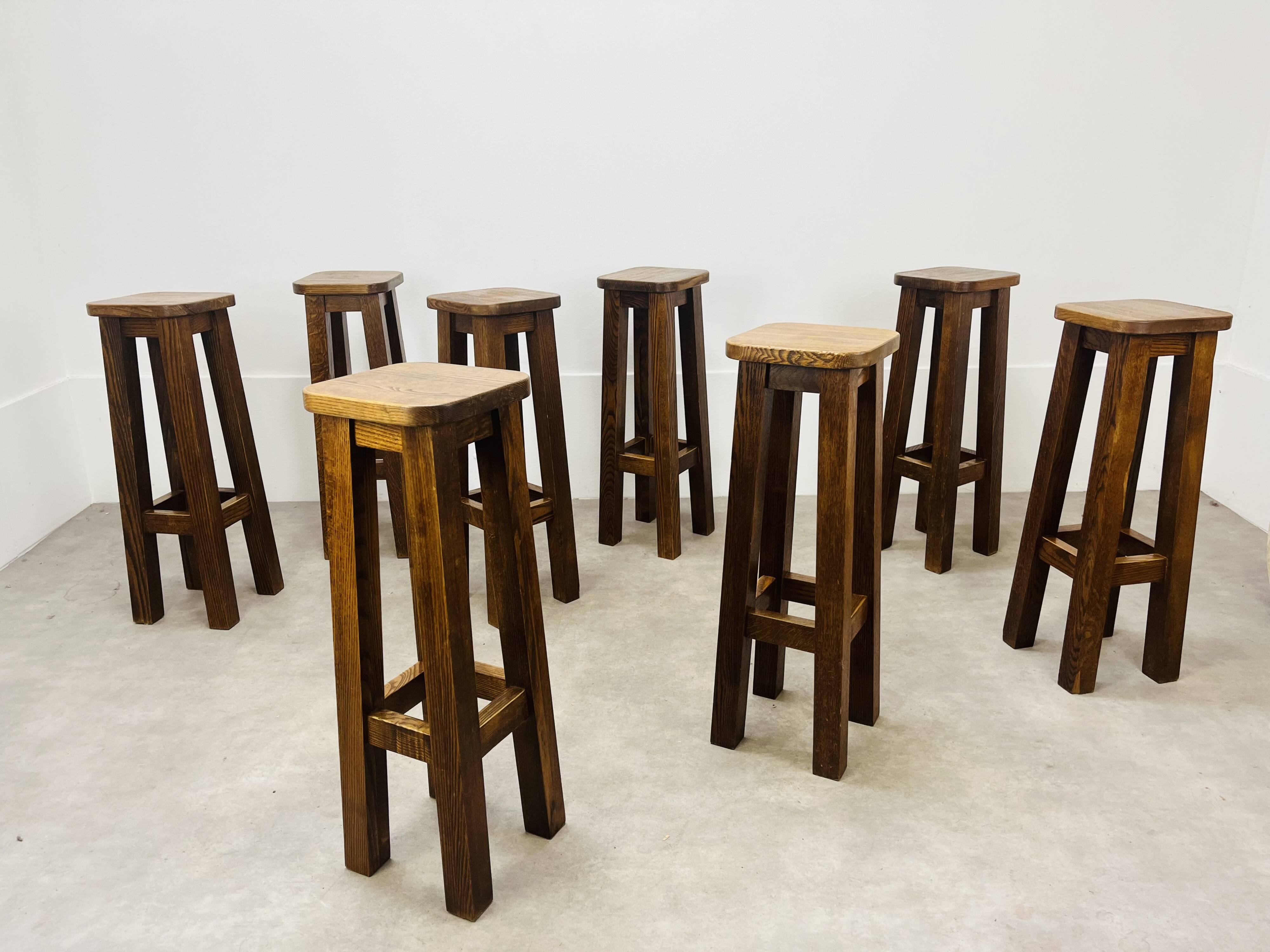 8 solid wood bar stools in brutalist style