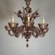 Venetian chandelier in Murano glass in amethyst colour, 8 light arms, 20th century