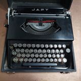 Machine à écrire Japy portable ancienne avec son coffre comme neuve