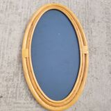 Oval rattan portrait mirror