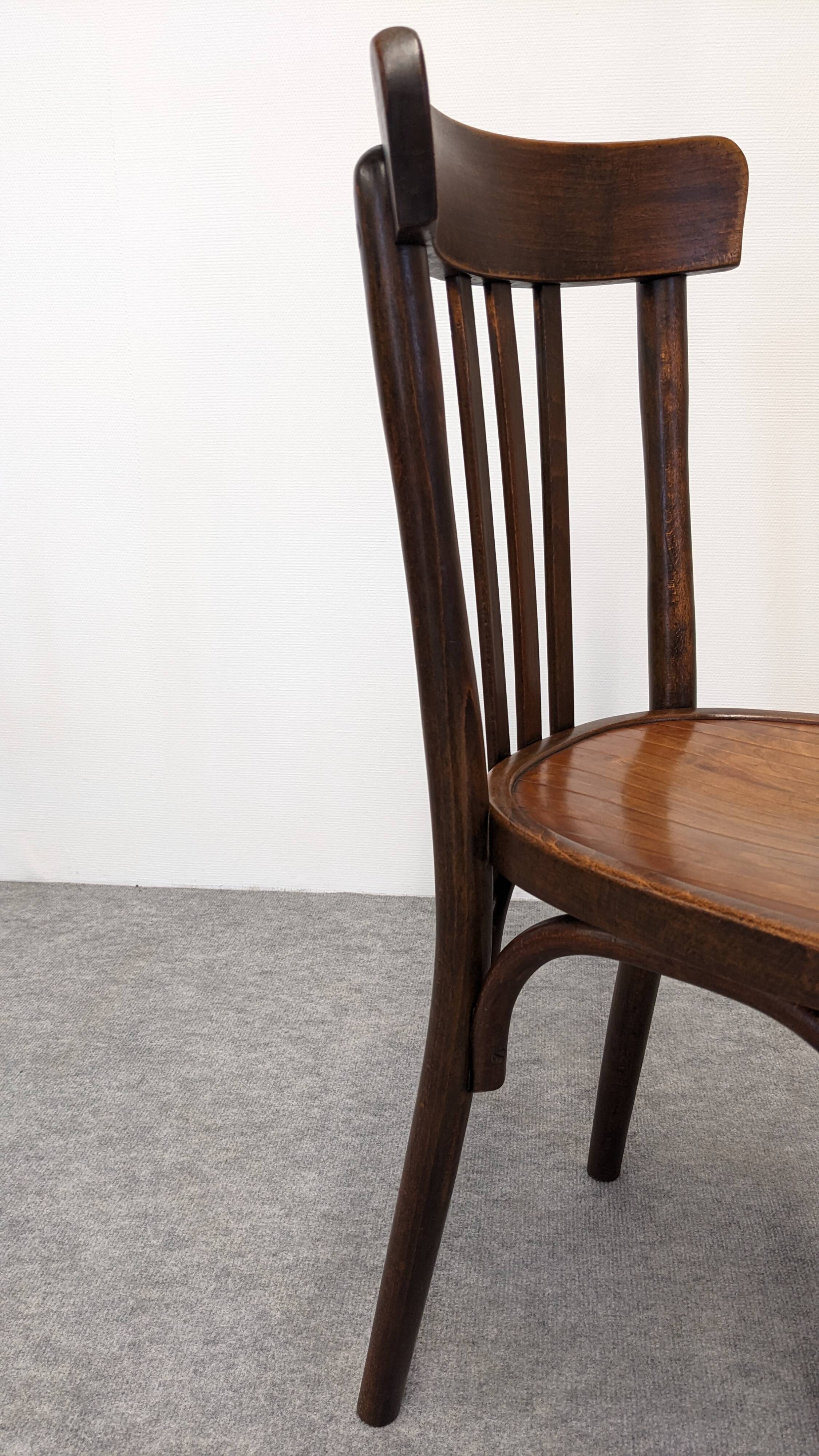 Set of 8 Baumann bistro chairs in bent beech, France circa 1930.