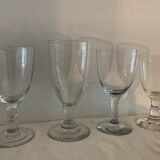 8 old blown and different foot wine glasses