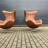 2x Fritz Hansen Egg chair by Arne Jacobsen in Cognac leather, new condition!