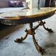 Oval coffee table in onyx and bronze – natural stone top – st