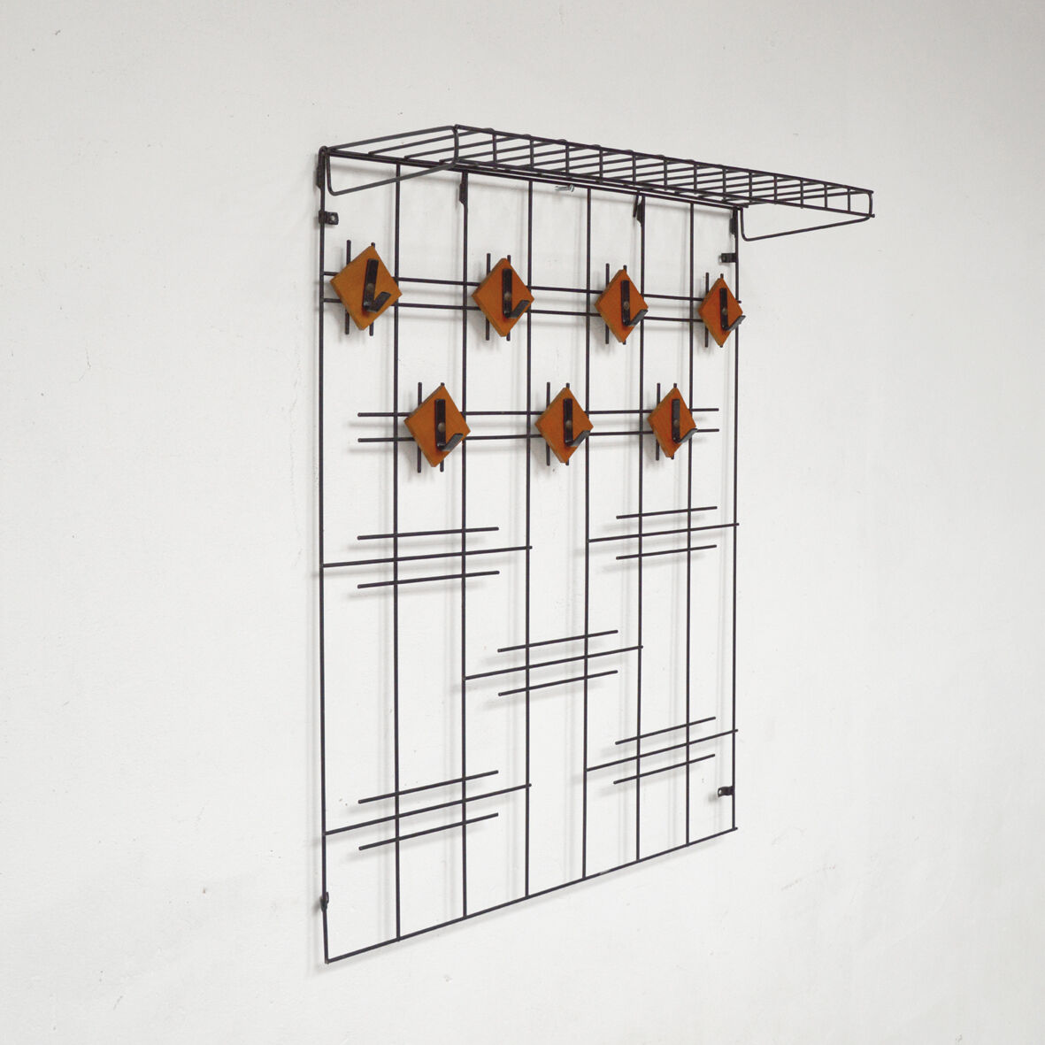 Metal and wood wall coat holders, 1960