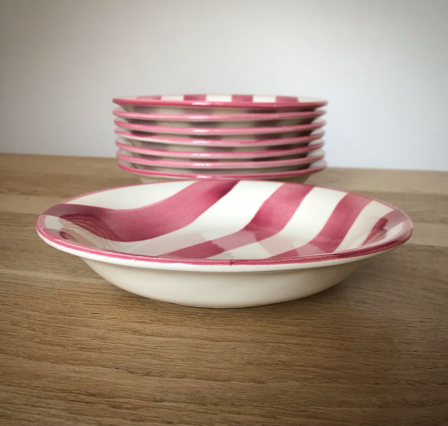 8 pink striped plates