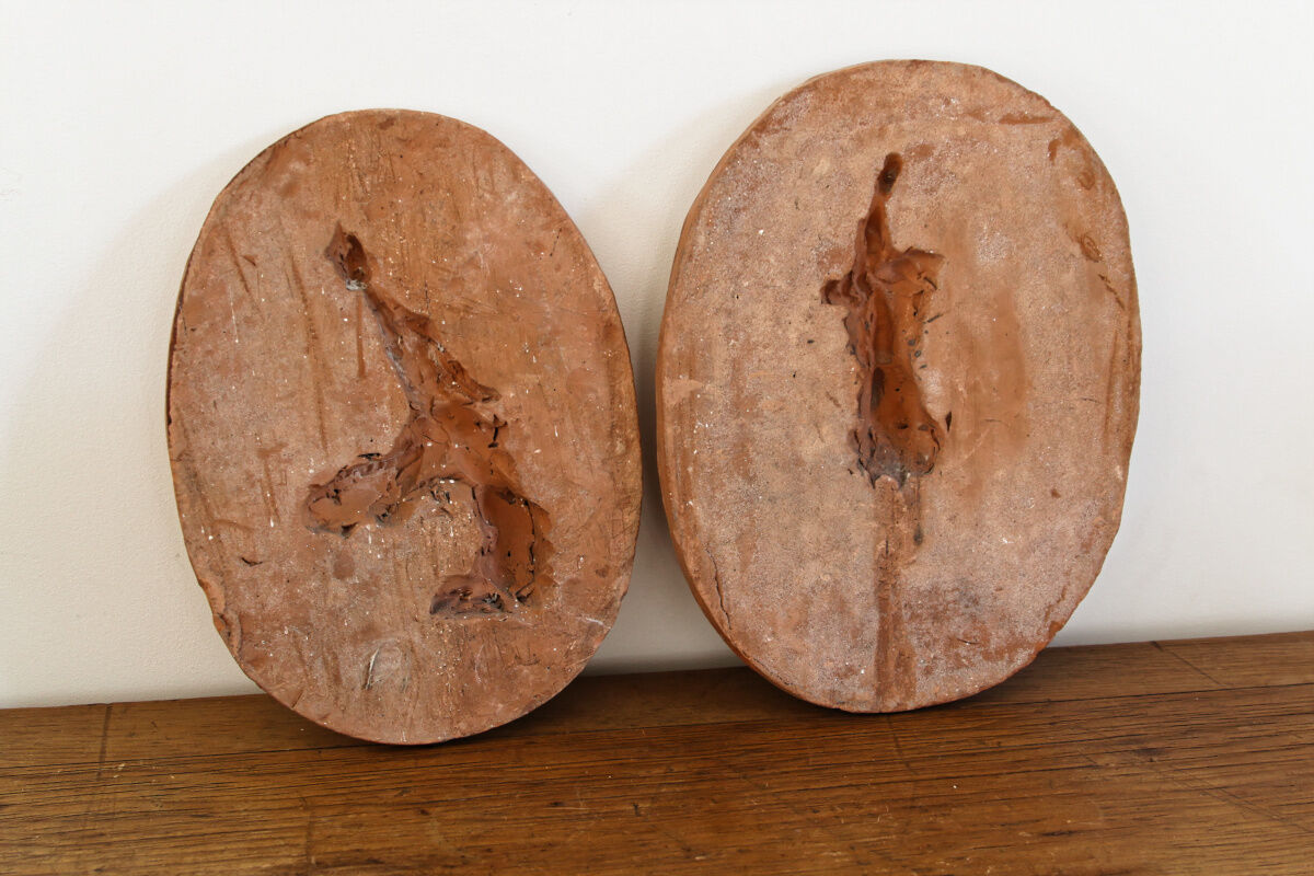 Pair of terracotta medallions