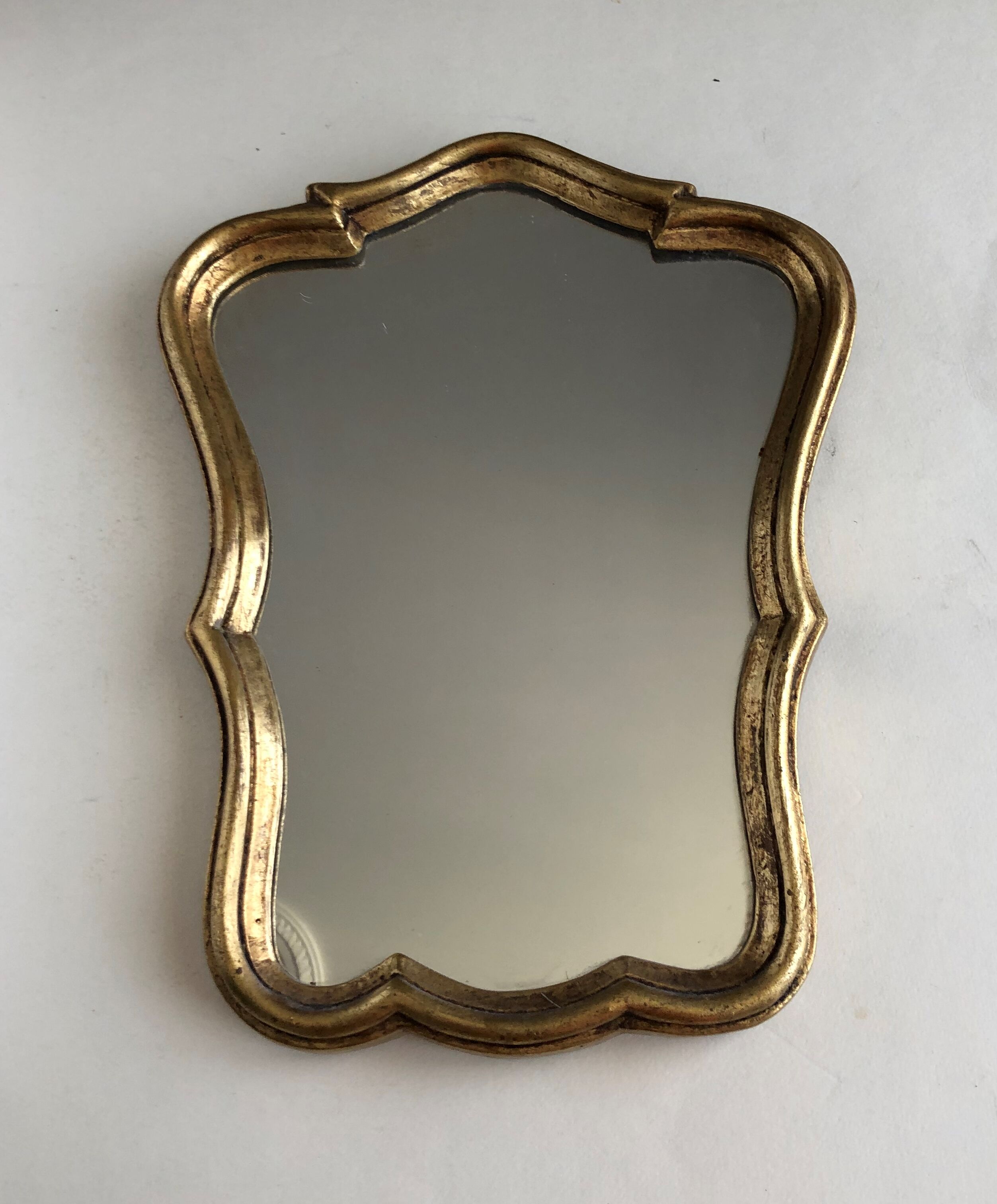 Small golden mirror
