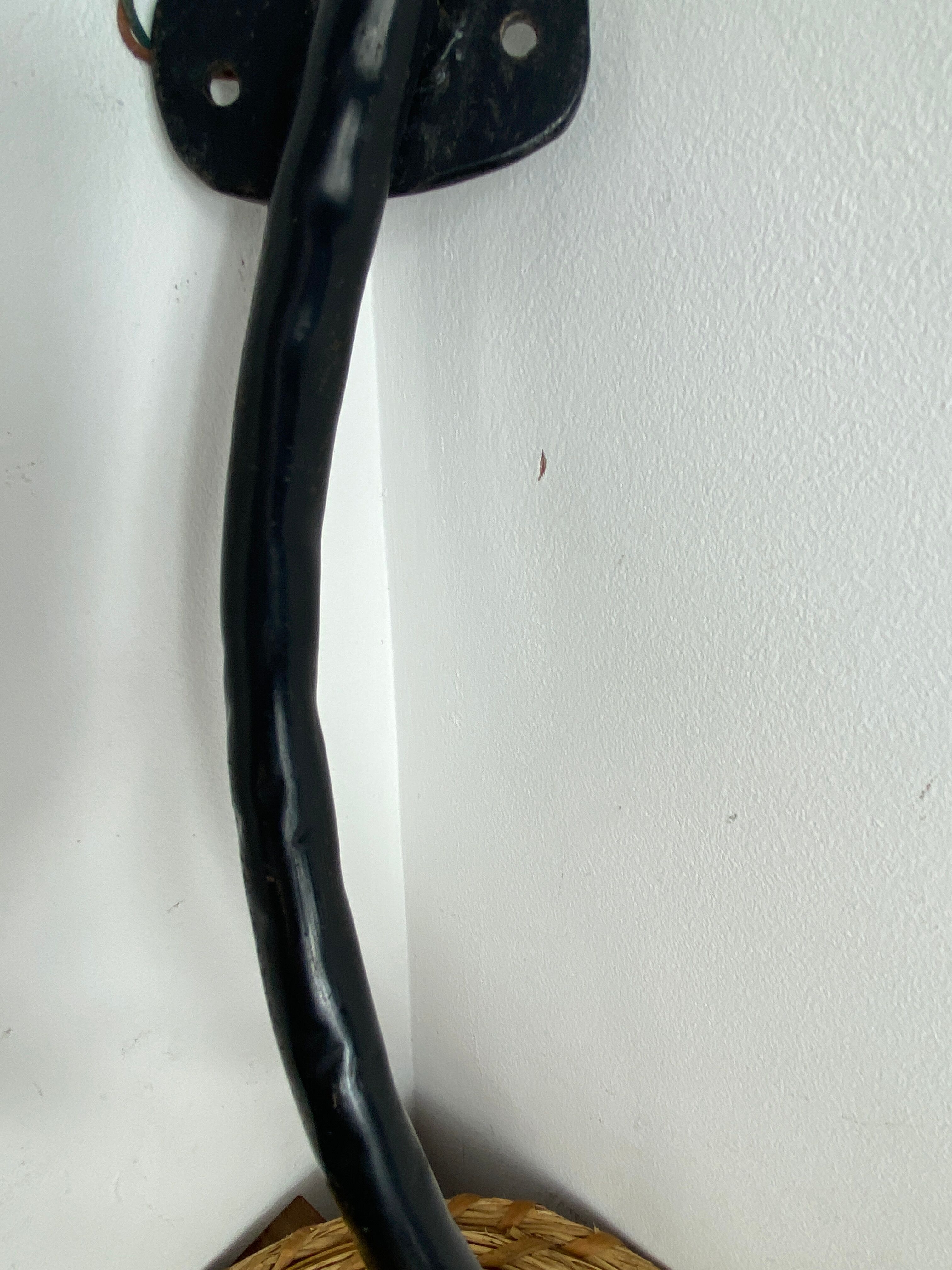 Wrought iron wall sconce