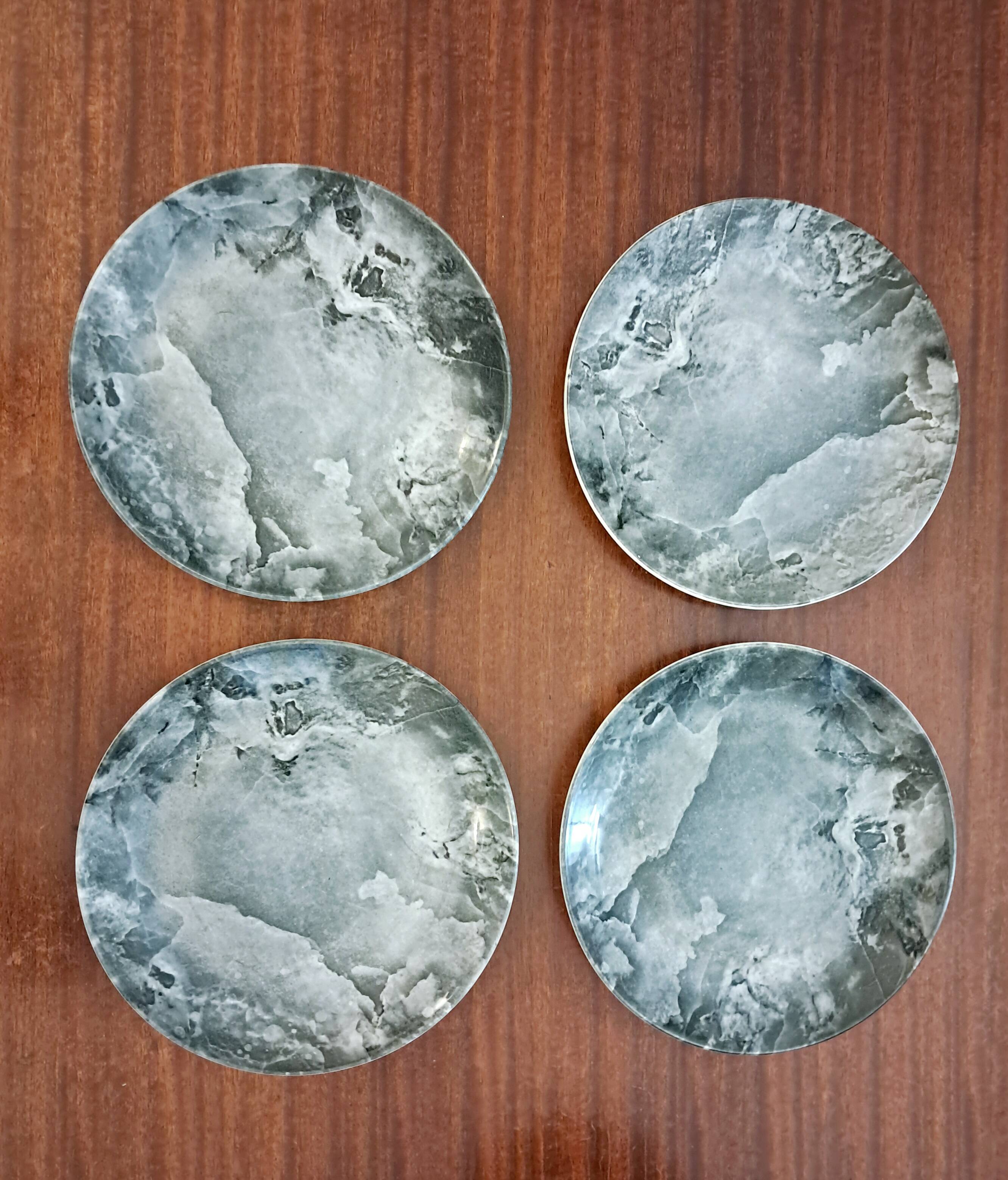 Four vintage marbled plates from Federated Potteries Staffordshire