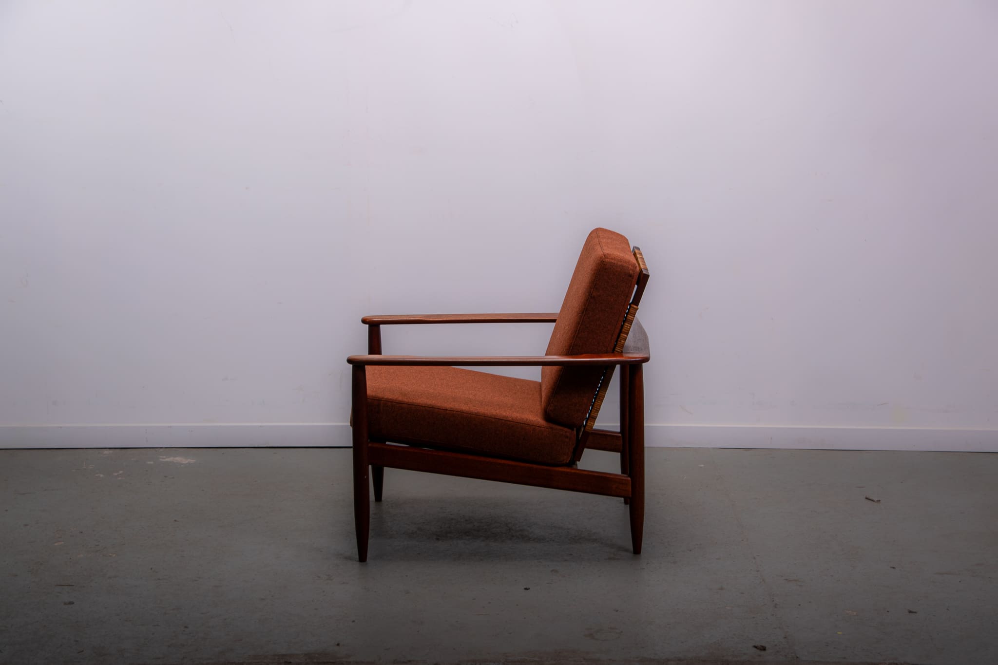 Mid-century easy chair in teak and cane circa 1970