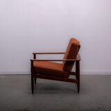 Mid-century easy chair in teak and cane circa 1970