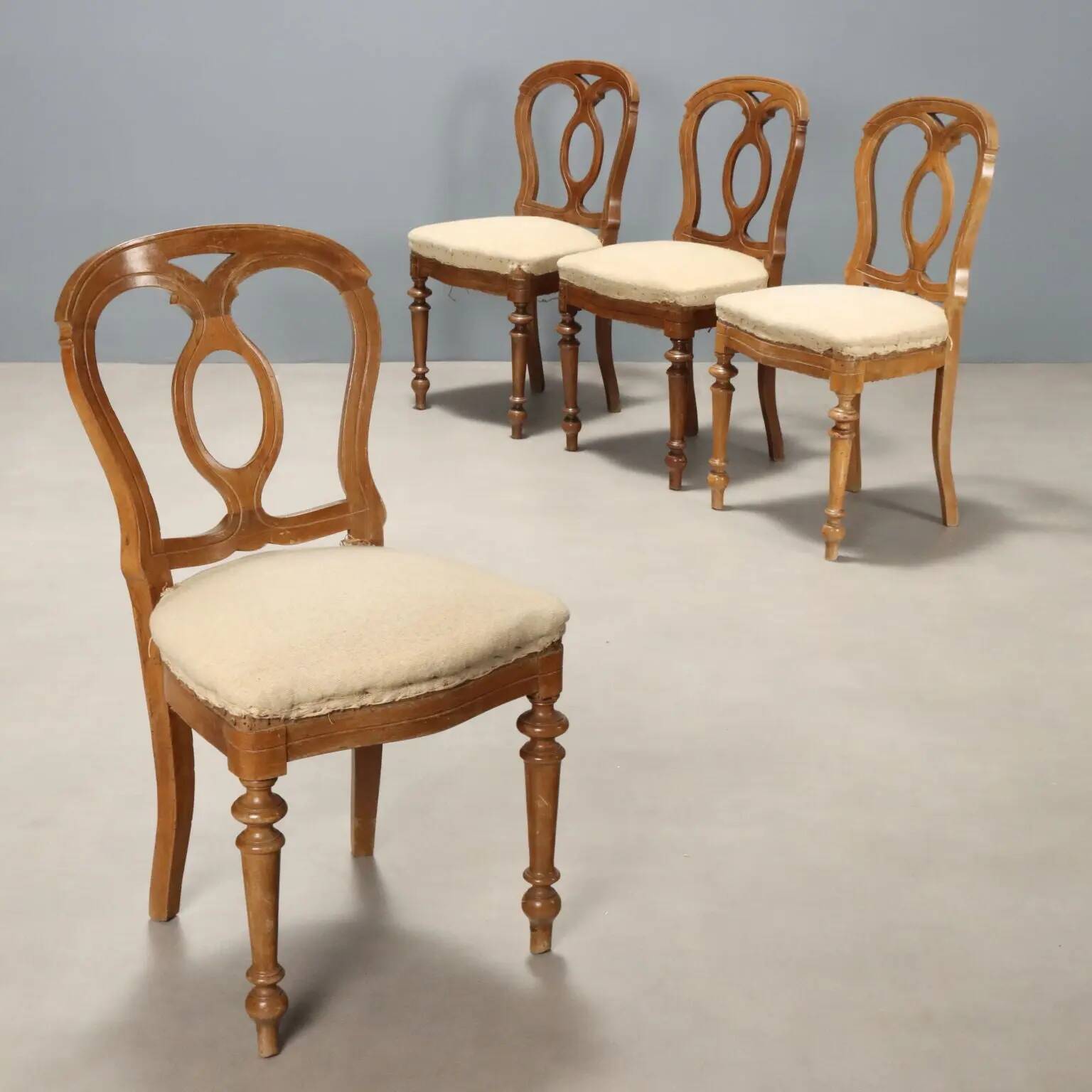Antique walnut chairs with horsehair upholstery, Italy, 19th century.