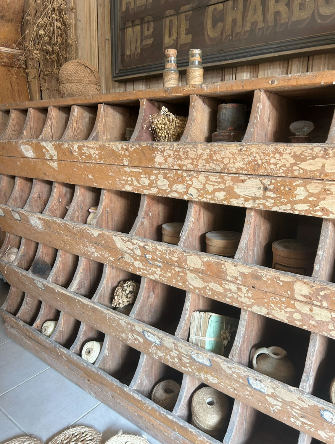 Antique seed cabinet with compartments