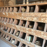 Antique seed cabinet with compartments