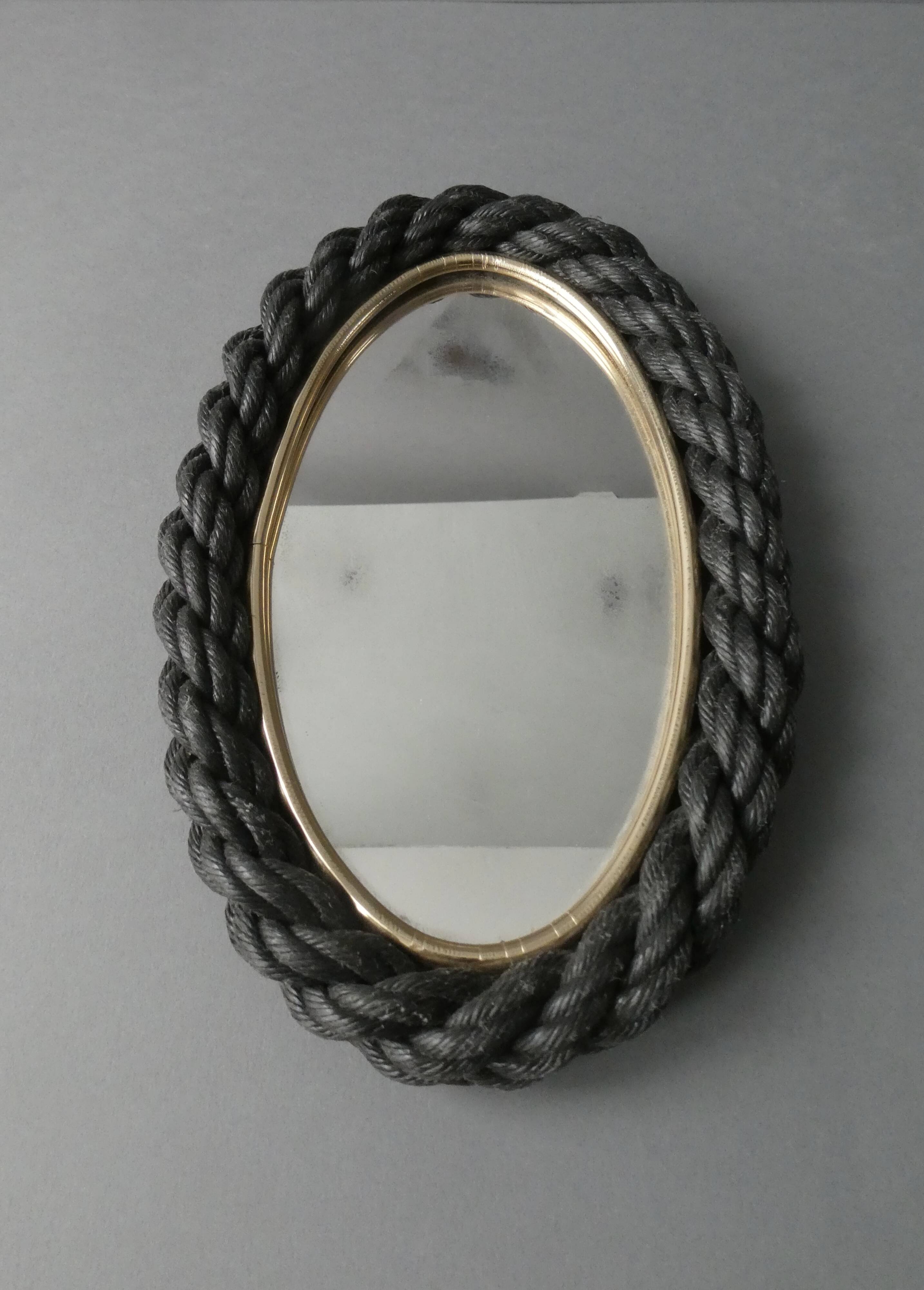Oval mirror in black rope and gold edging, 1960s