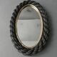 Oval mirror in black rope and gold edging, 1960s