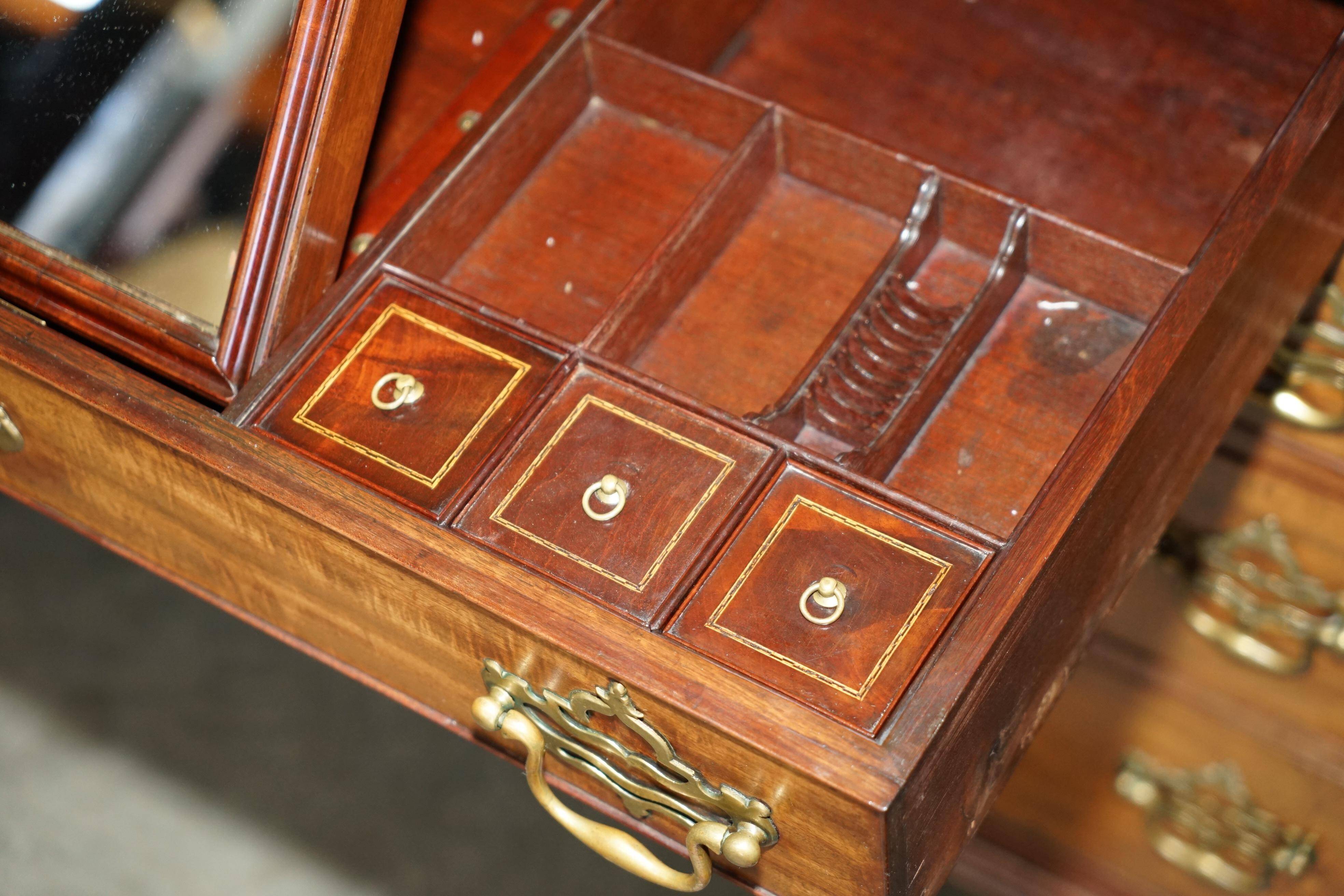 George III commode circa 1770 in walnut by Thomas Chippendale.