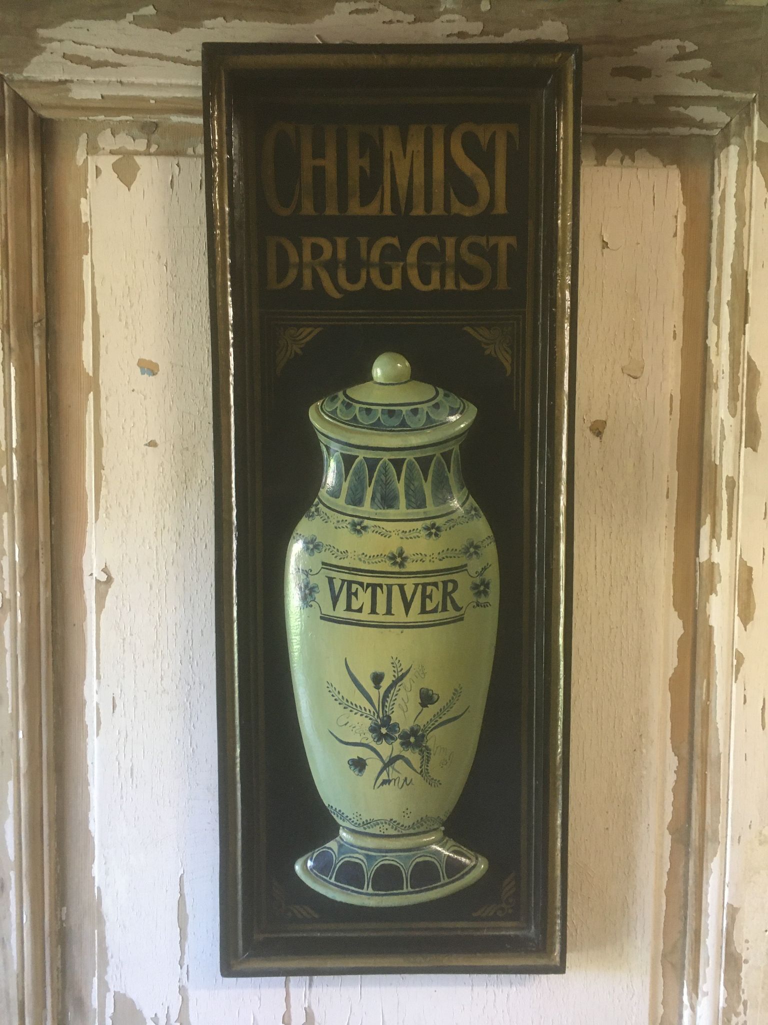 Wooden relief panel "Chemist Druggist" from Country corner