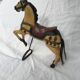 Wooden horse with period ironwork support
