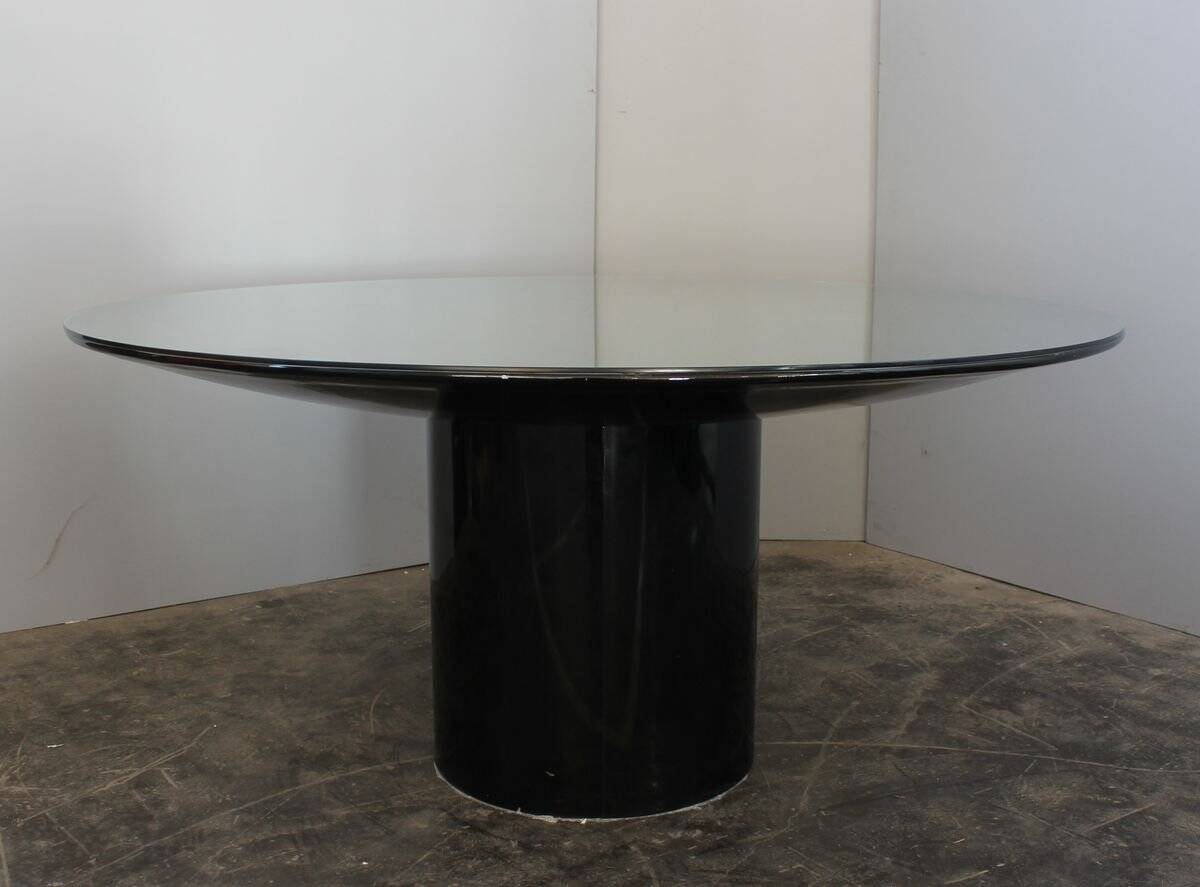 Black lacquered glass table and glass in the hoof style, Italy.
