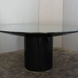 Black lacquered glass table and glass in the hoof style, Italy.