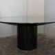 Black lacquered glass table and glass in the hoof style, Italy.