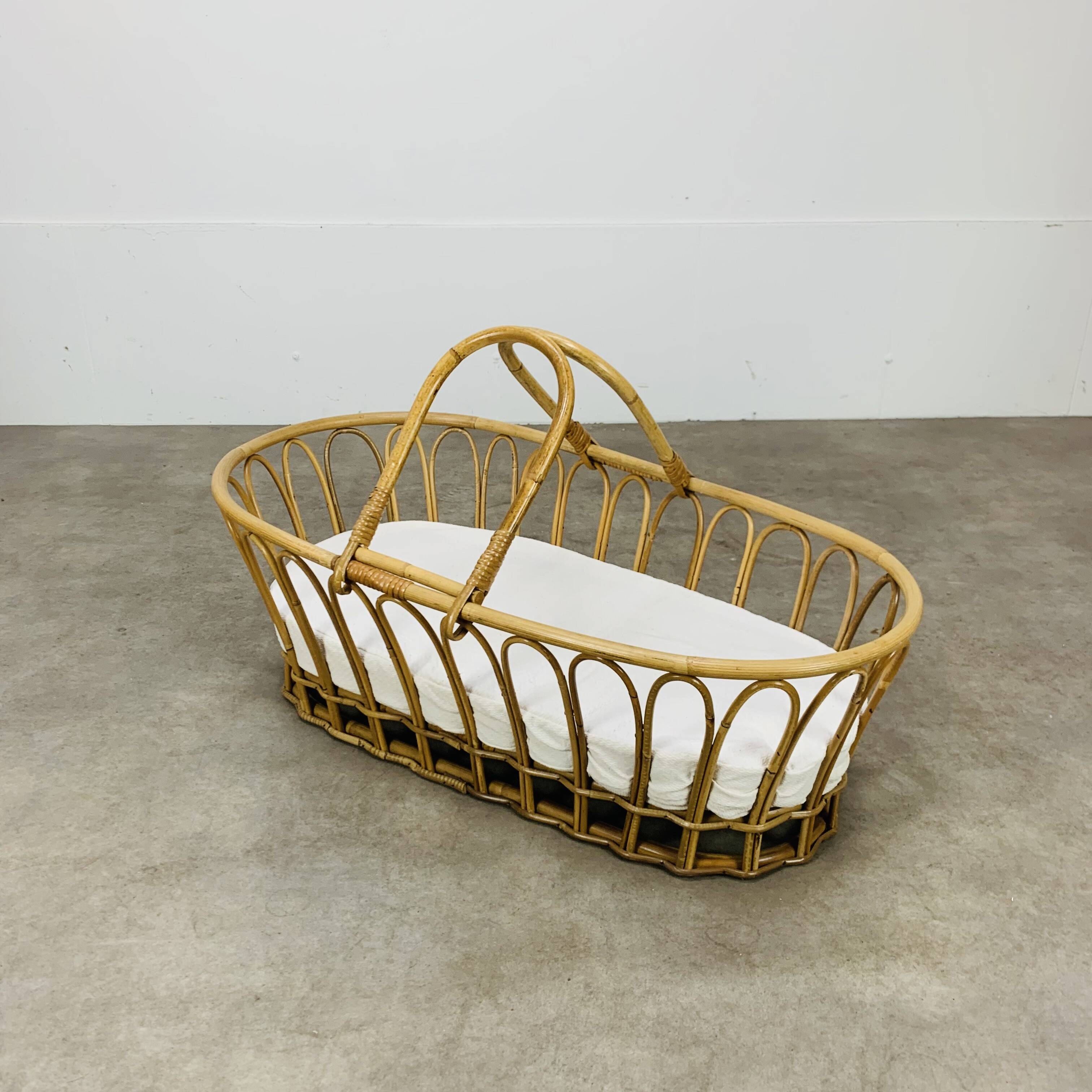 Vintage rattan baby bassinet
