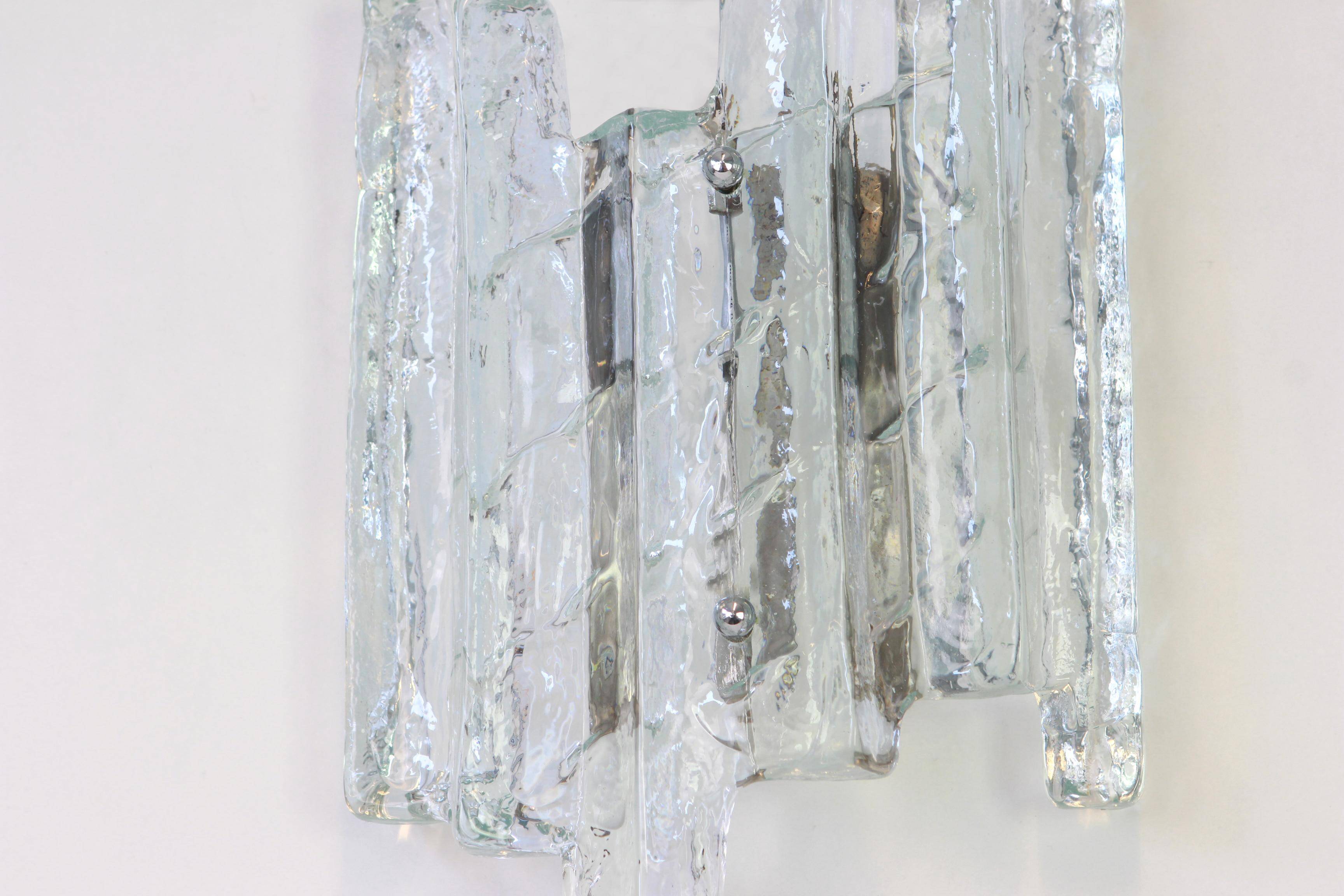 Pairs of large Kalmar-style wall lights in Murano glass, Austria, 1960s.