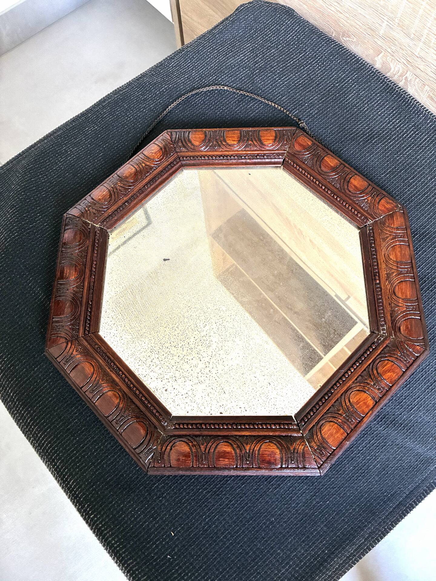 Octagonal mirror, glossy varnished oak, Art Deco.