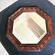 Octagonal mirror, glossy varnished oak, Art Deco.