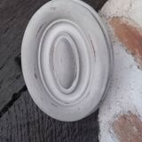 Pair of patinated oval woodwork