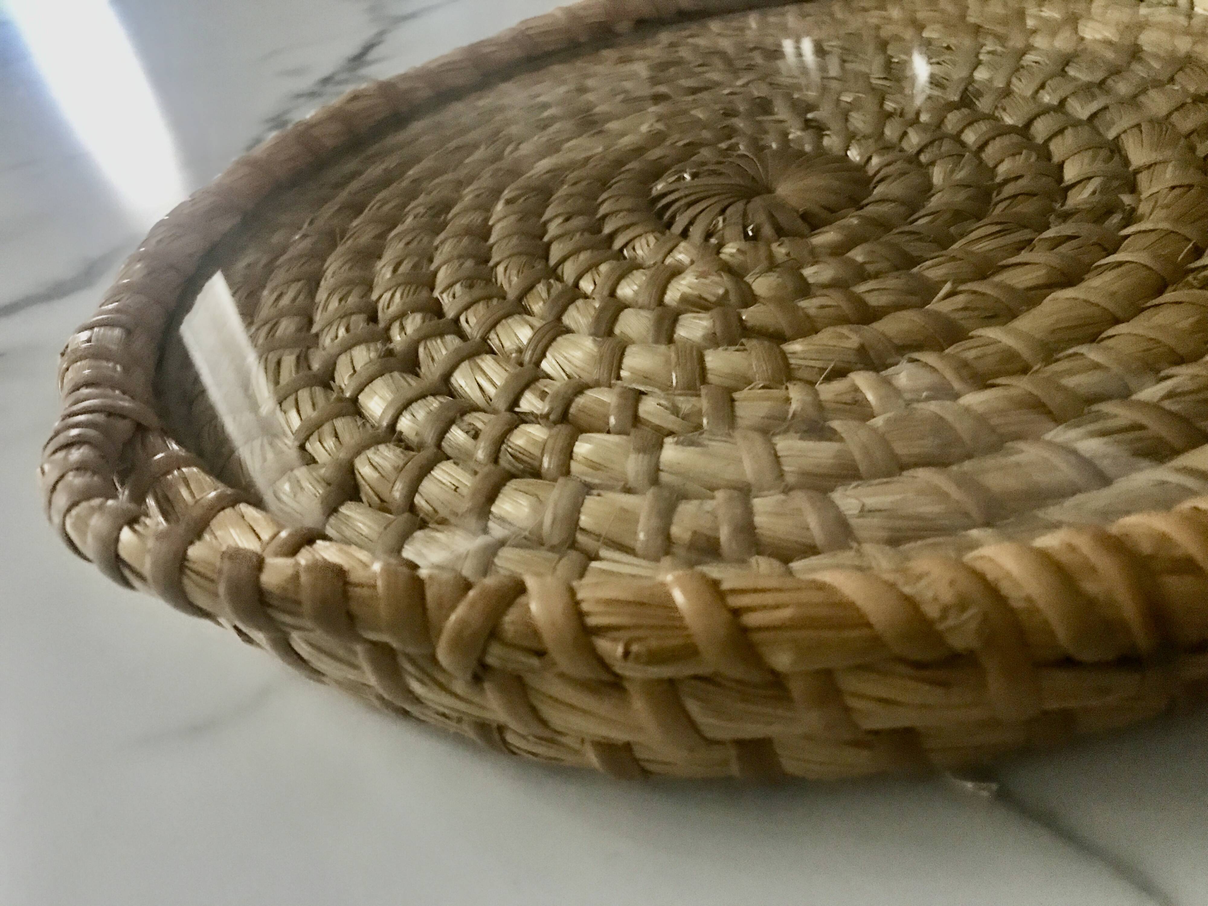 Turned wicker tray and vintage glass