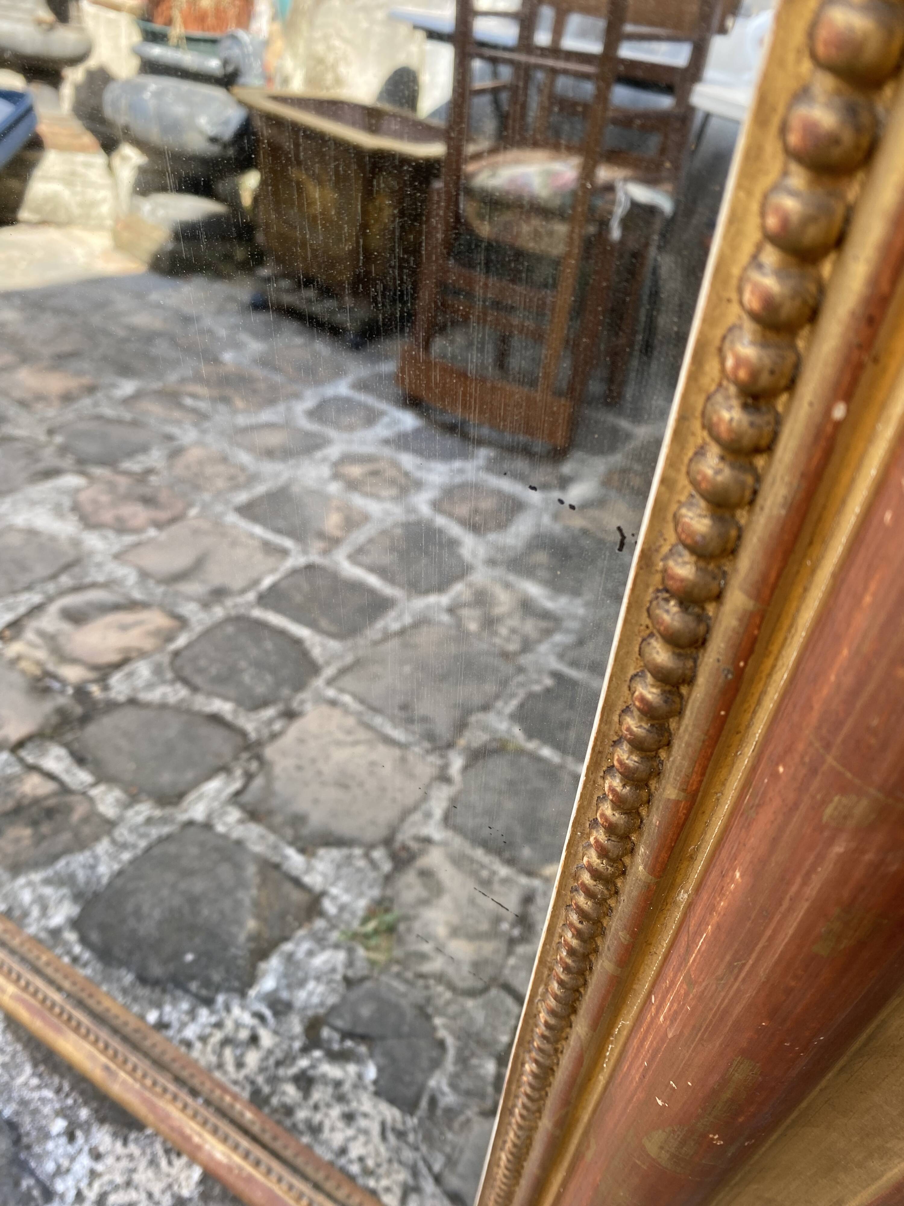 Beautiful early 20th-century fireplace mirror.