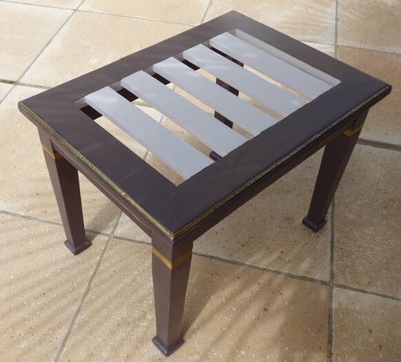 Coffee table or side table in style with its brass strips totalem.