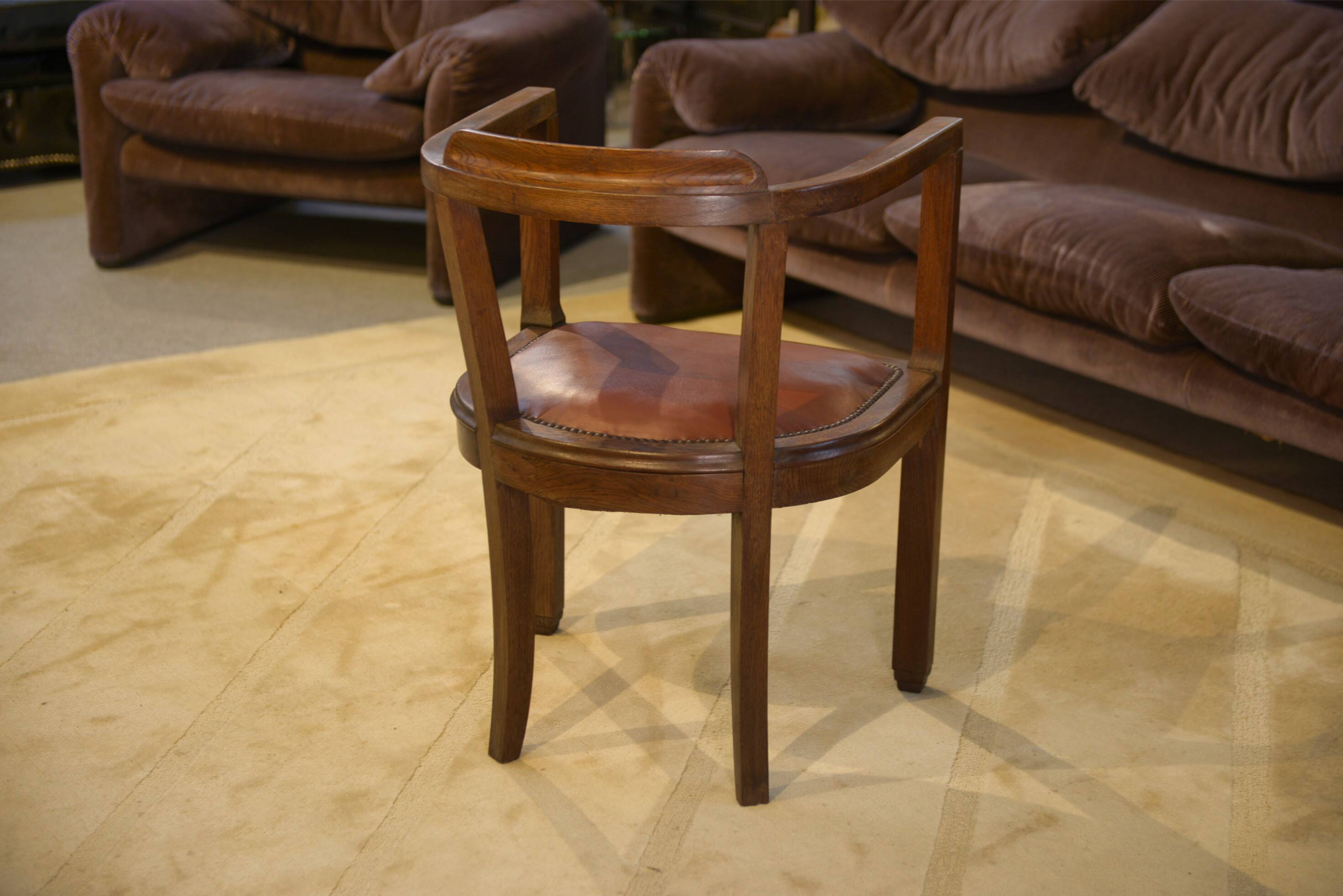 Fauteuil en chêne et skaï 1940’s