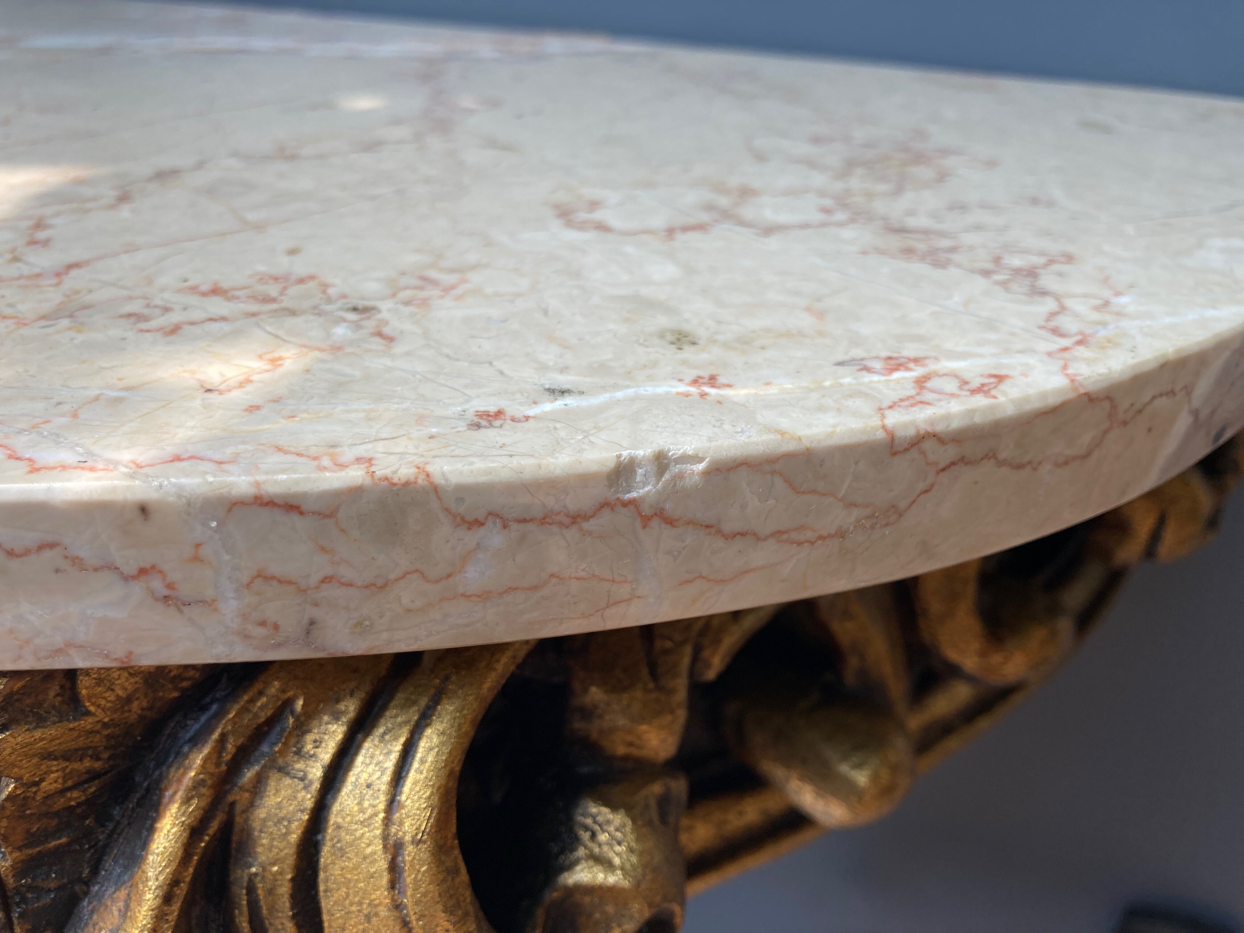Carved wooden and marble console