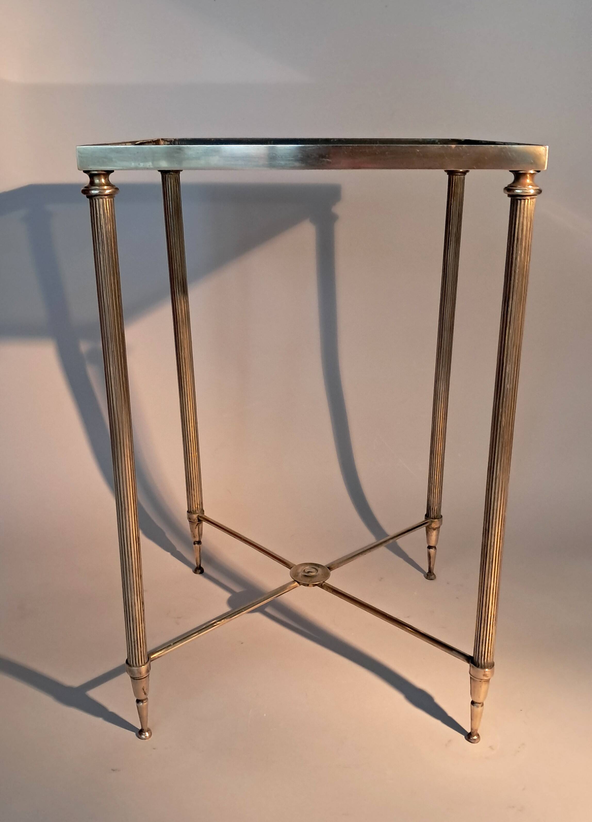 Gold brass side table in neoclassical style, circa 1960.