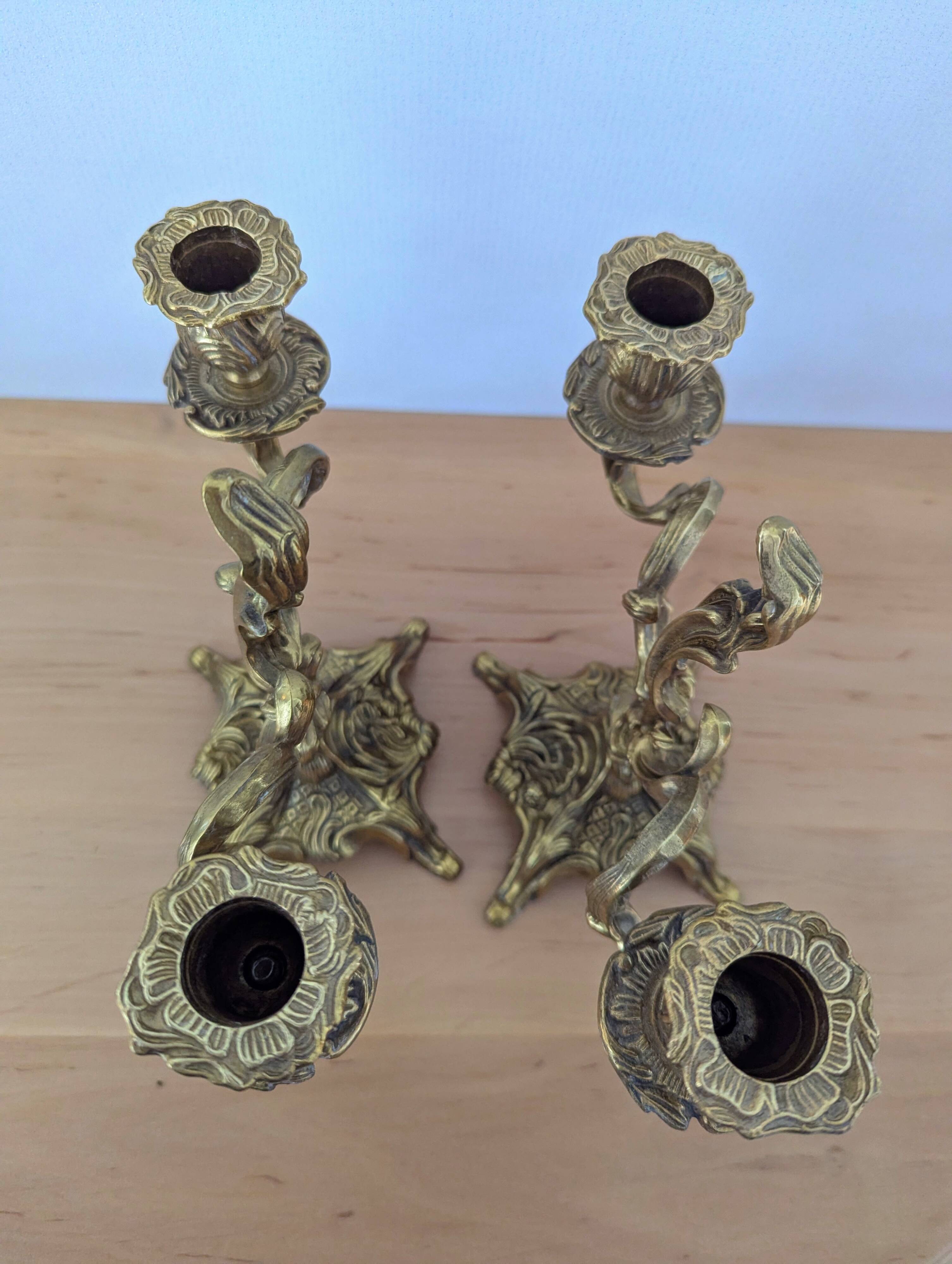 Pair of antique bronze candlesticks in the Louis XV rococo style