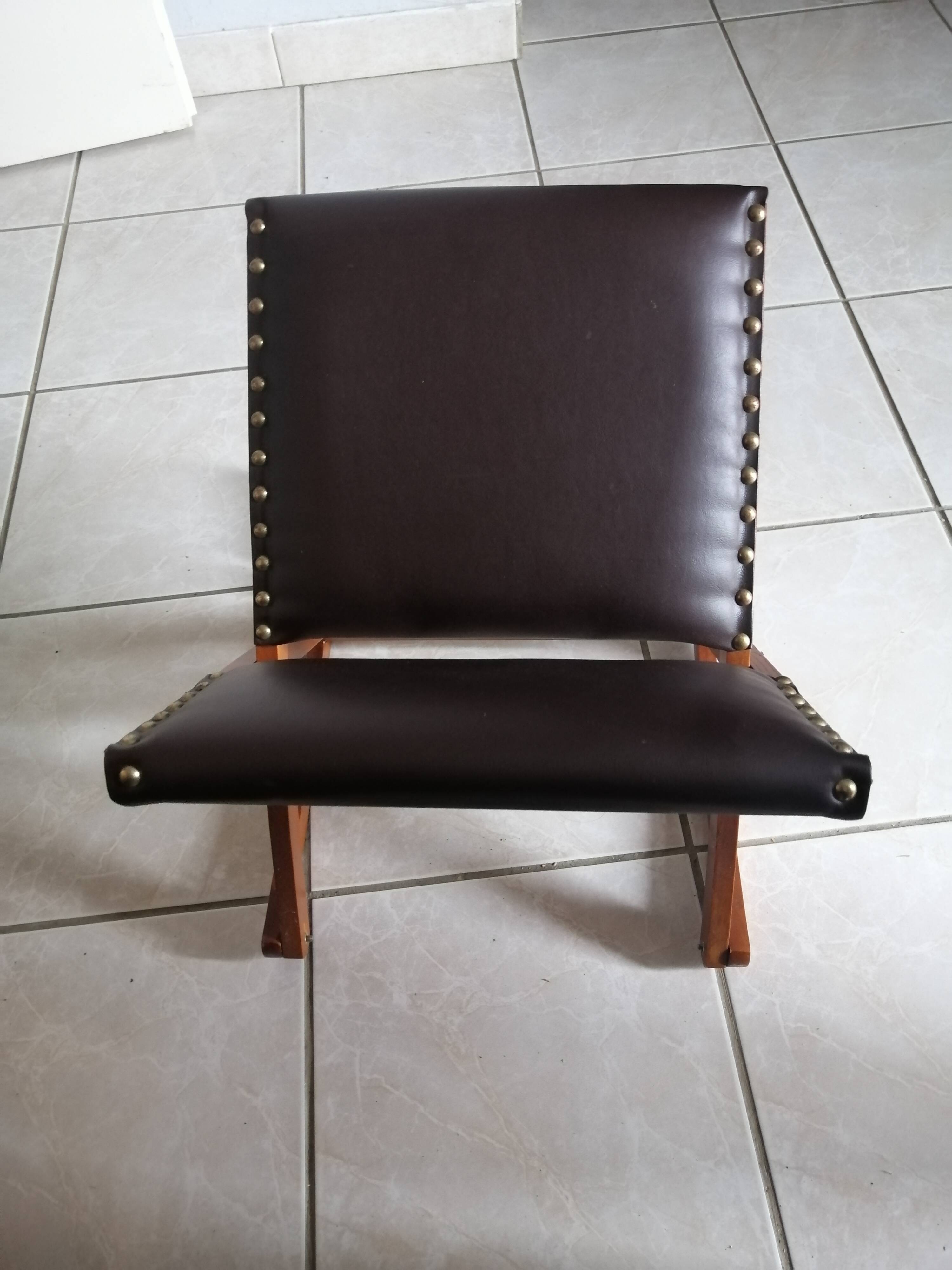 Vintage rocking footrests in wood and faux leather